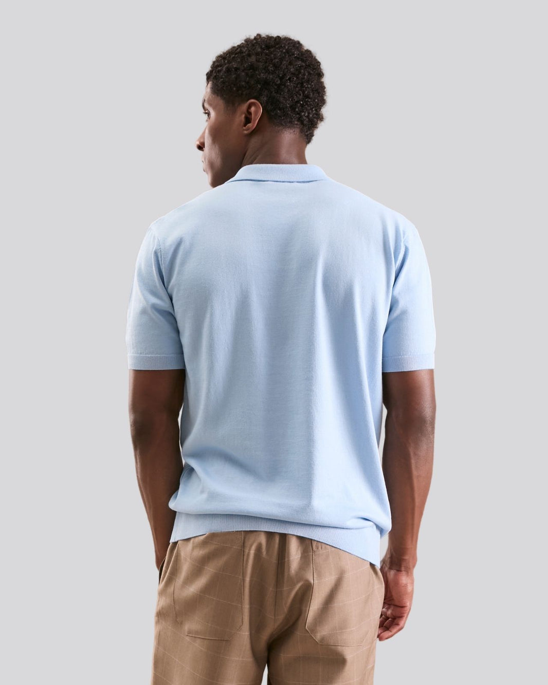 Polo tricô azul claro